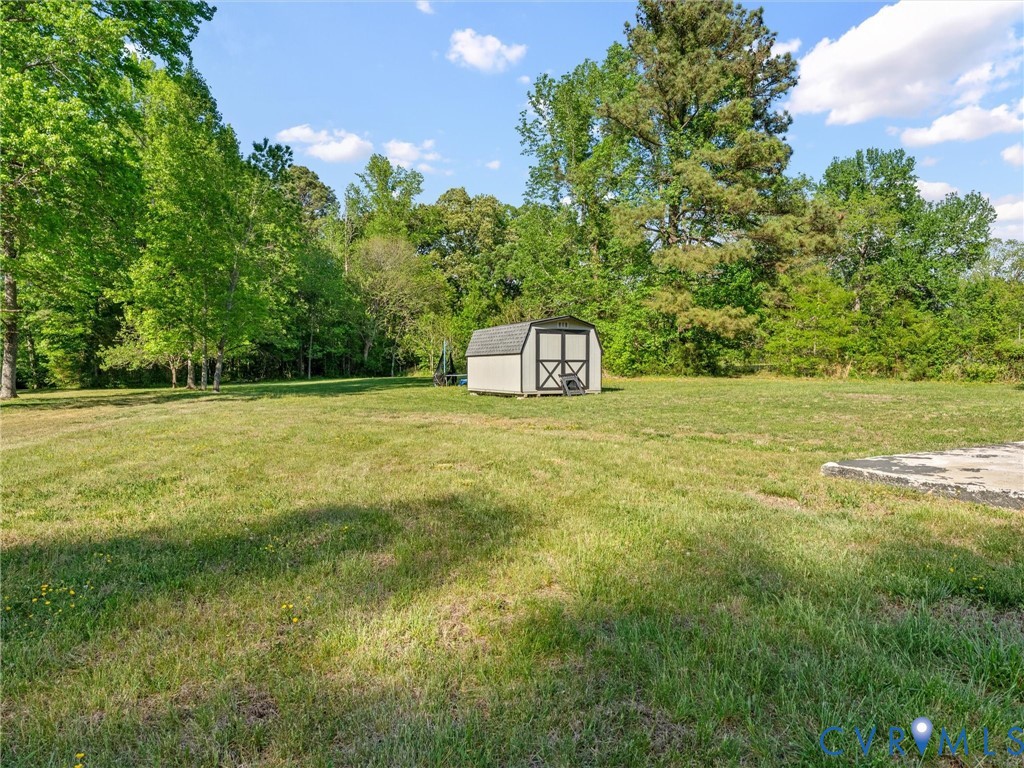 1920 Meadow Road Sandston, VA 23150 - Photo 42 of 46 a view of a field with an trees