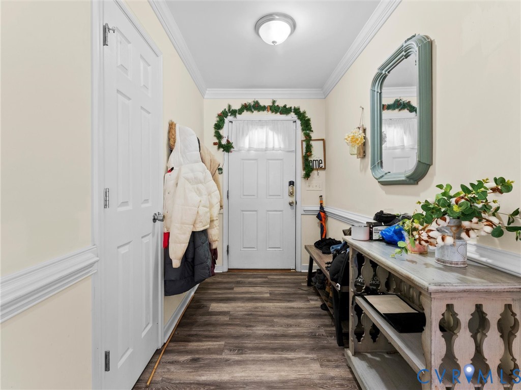 1920 Meadow Road Sandston, VA 23150 - Photo 5 of 46 a view of a hallway to a livingroom with furniture