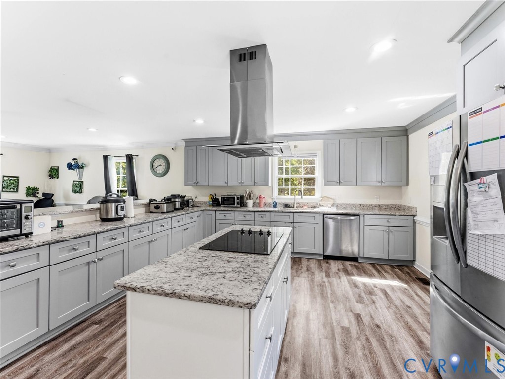 1920 Meadow Road Sandston, VA 23150 - Photo 10 of 46 a kitchen with a sink stove and cabinets