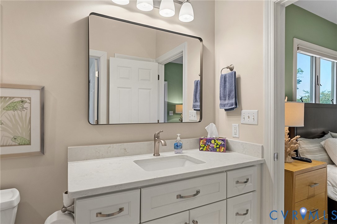 447 Tranquility Road Reedville, VA 22539 - Photo 51 of 82 Vanity with integrated sink, brushed nickel faucet