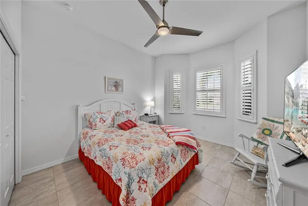 a view of a lake with houses in the background