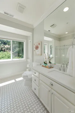 a bathroom with a sink a toilet and a bathtub