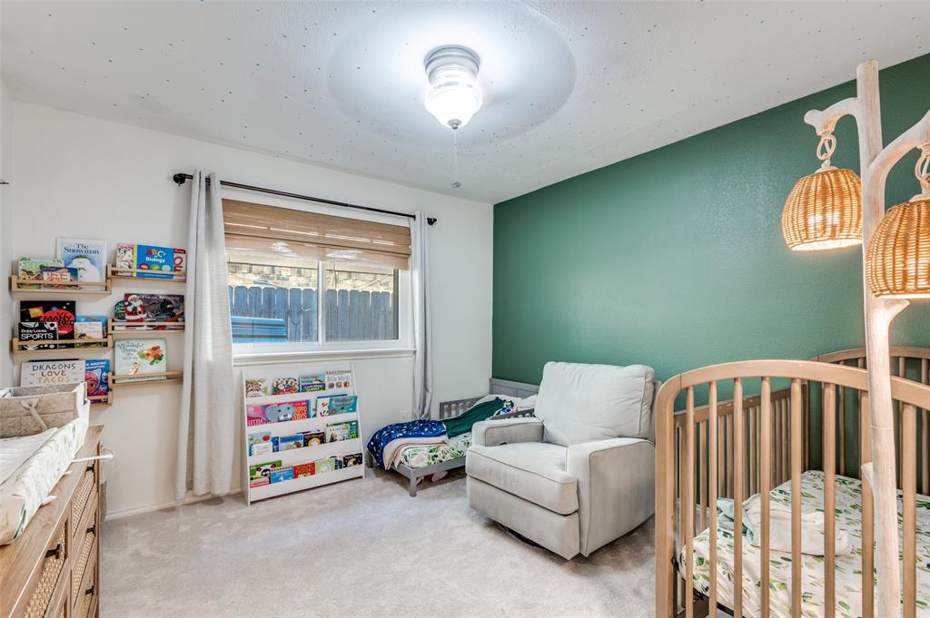 3700 Wedgworth Road South Fort Worth, TX 76133 - Photo 11 of 12 a bedroom with furniture and a window