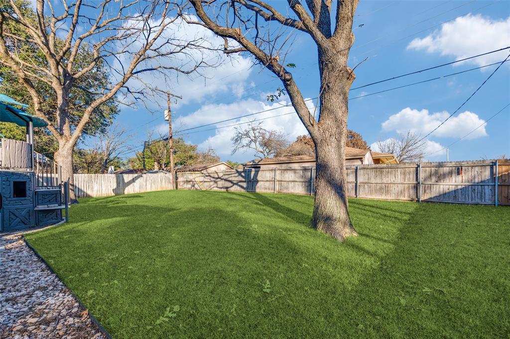 3700 Wedgworth Road South Fort Worth, TX 76133 - Photo 12 of 12 a view of a yard with a large tree