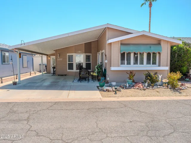 a front view of a house with a patio