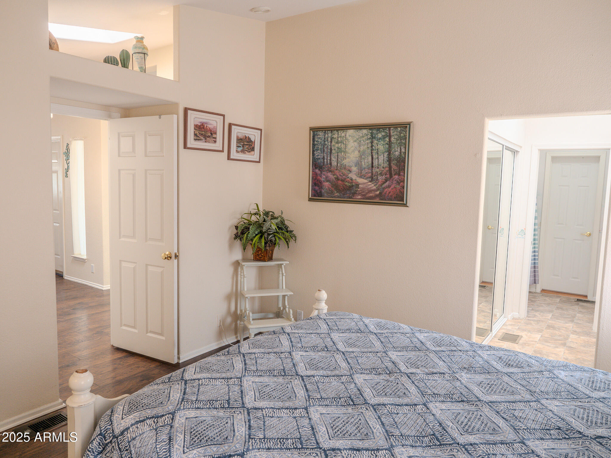 8865 East Baseline Road, Unit 1207 Mesa, AZ 85209 - Photo 29 of 40 a bedroom with a bed and a window