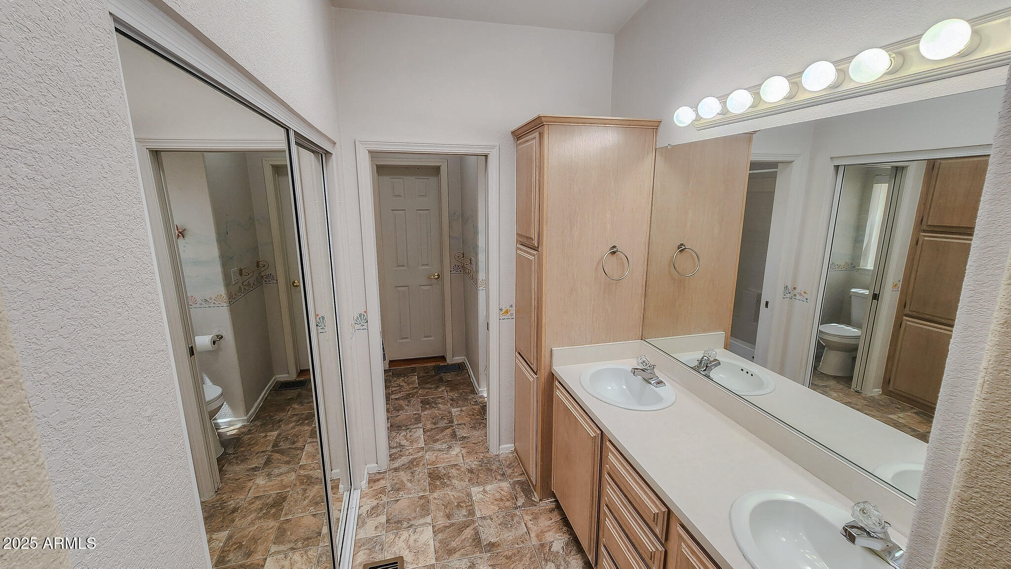 8865 East Baseline Road, Unit 1207 Mesa, AZ 85209 - Photo 32 of 40 a spacious bathroom with a double vanity sink a mirror and a shower