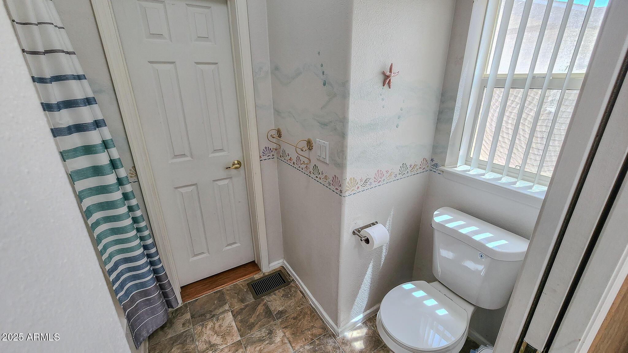8865 East Baseline Road, Unit 1207 Mesa, AZ 85209 - Photo 35 of 40 a bathroom with a sink and toilet