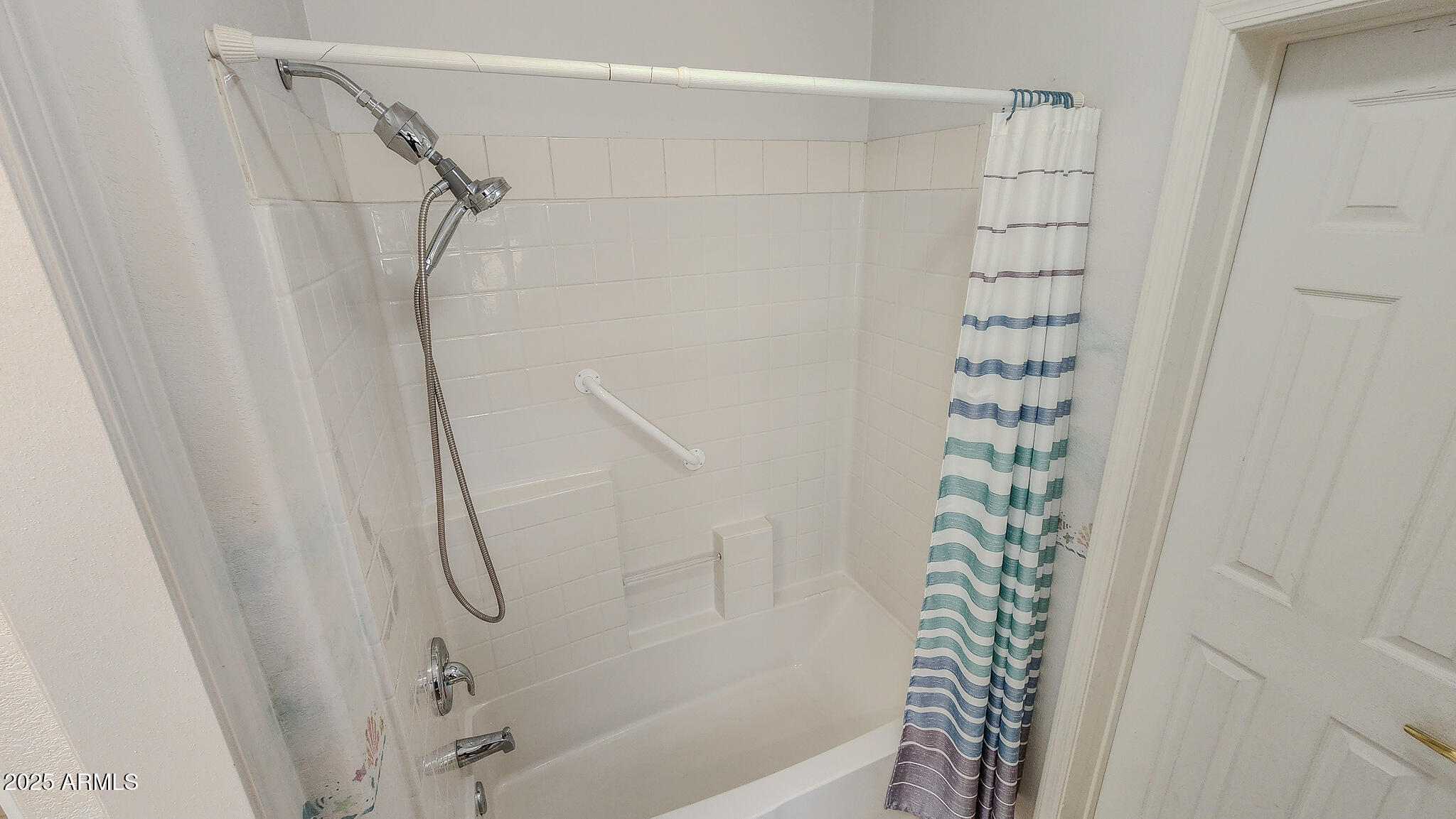 8865 East Baseline Road, Unit 1207 Mesa, AZ 85209 - Photo 36 of 40 a bathroom with a shower