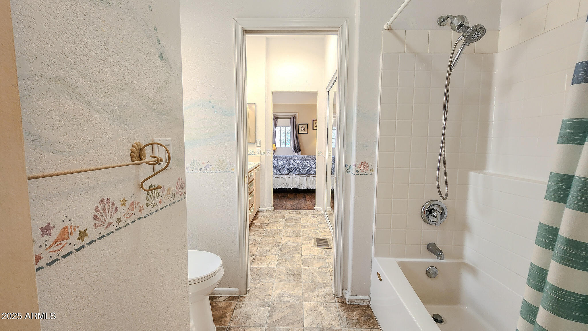 8865 East Baseline Road, Unit 1207 Mesa, AZ 85209 - Photo 37 of 40 a bathroom with a bathtub and a shower