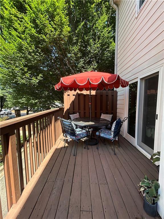 1580 Commerce Drive, Unit B1 Decatur, GA 30030 - Photo 13 of 19 a view of a patio with a table and chairs