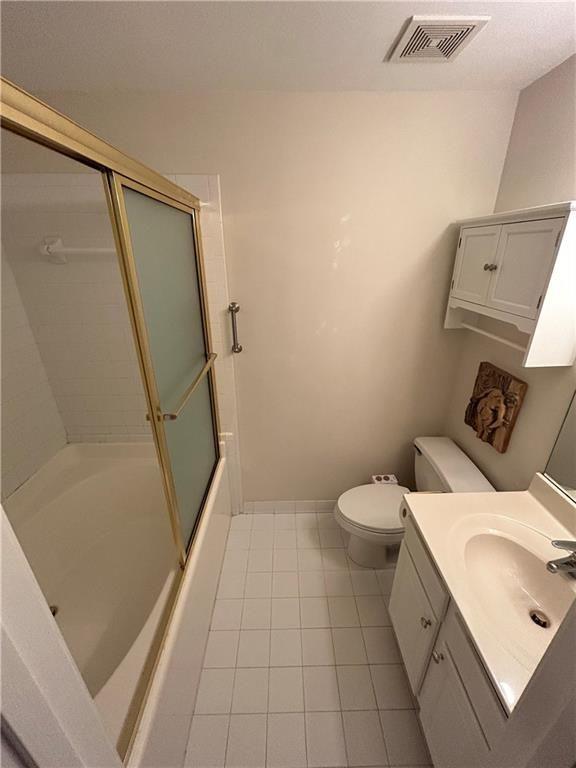 1580 Commerce Drive, Unit B1 Decatur, GA 30030 - Photo 16 of 19 a white toilet sitting next to a bath tub