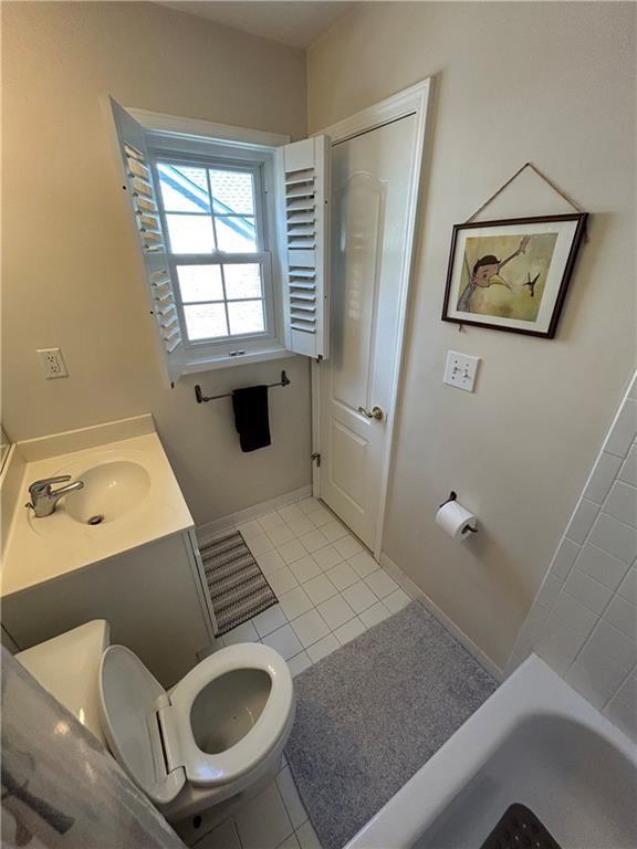 1580 Commerce Drive, Unit B1 Decatur, GA 30030 - Photo 17 of 19 a bathroom with a toilet and a sink