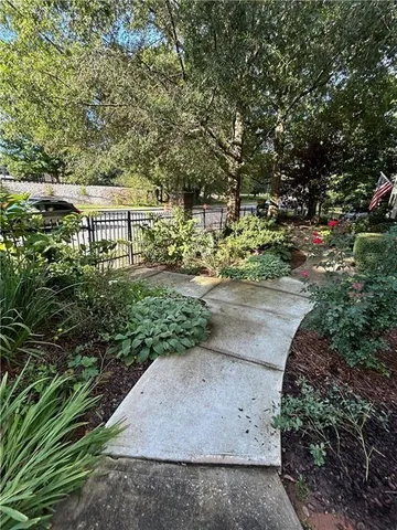 a view of a garden with pathway