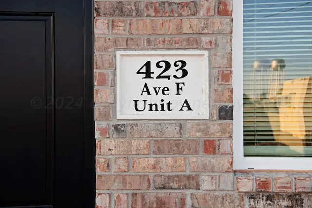 a sign that is on the side of a building