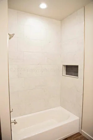 a bathroom with a bathtub