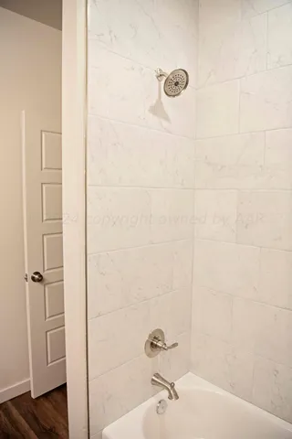 a bathroom with a bathtub