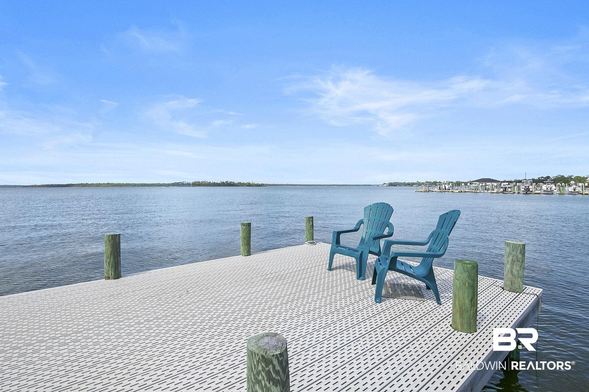 25957 Canal Road, Unit 302 Orange Beach, AL 36561 - Photo 4 of 26 Dock area featuring a water view