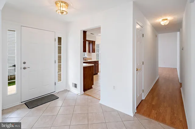 a view of a hallway with closet area