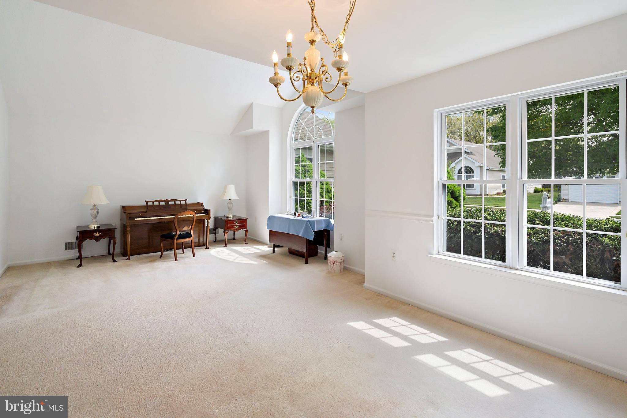 12 Rye Court Jackson, NJ 08527 - Photo 6 of 32 a living room with furniture and a large window