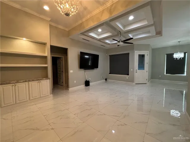 a view of a livingroom with a kitchen