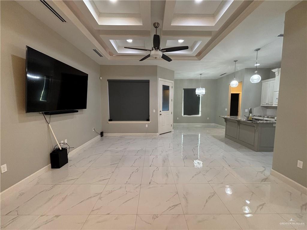 2601 Tulipan Avenue Mission, TX 78574 - Photo 13 of 27 a view of a livingroom with a kitchen