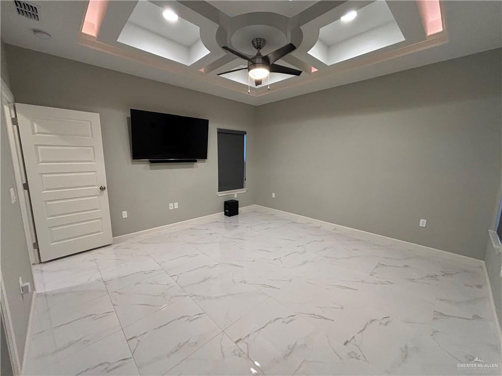 2601 Tulipan Avenue Mission, TX 78574 - Photo 16 of 27 a view of a livingroom with a flat screen tv