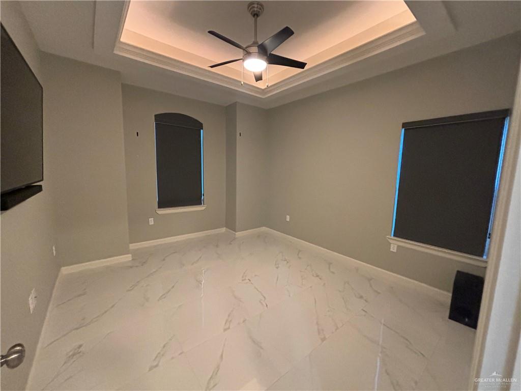 2601 Tulipan Avenue Mission, TX 78574 - Photo 23 of 27 a view of an empty room with a ceiling fan