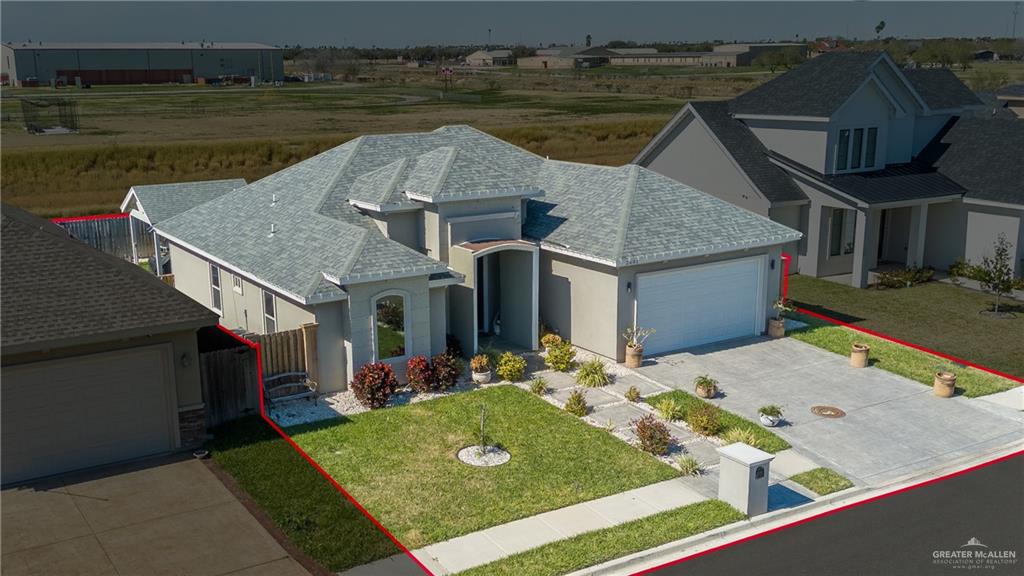 2601 Tulipan Avenue Mission, TX 78574 - Photo 3 of 27 an aerial view of a house with swimming pool