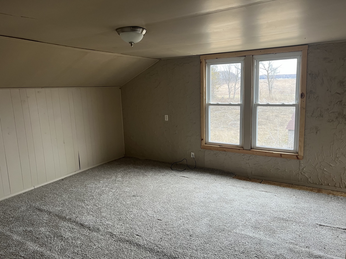 5597 East Boy Scout Road St. Anne, IL 60964 - Photo 12 of 25 an empty room with a window