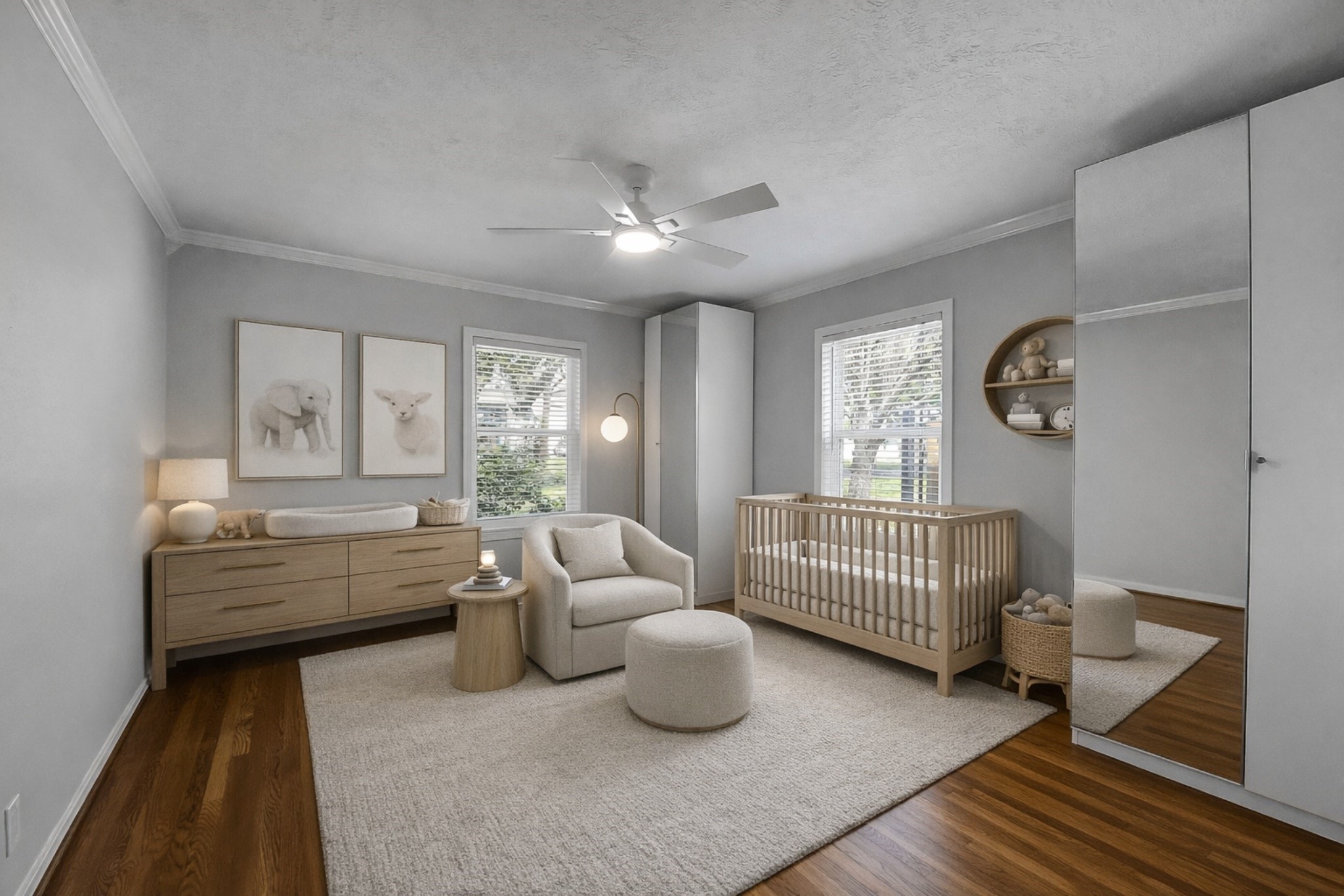 9623 Val Verde Street Houston, TX 77063 - Photo 16 of 26 Secondary bedroom #1 — virtually staged as a home office — featuring large front-facing window w/retractable blinds & ceiling fan w/light. Notice the two storage closets flanking the window.