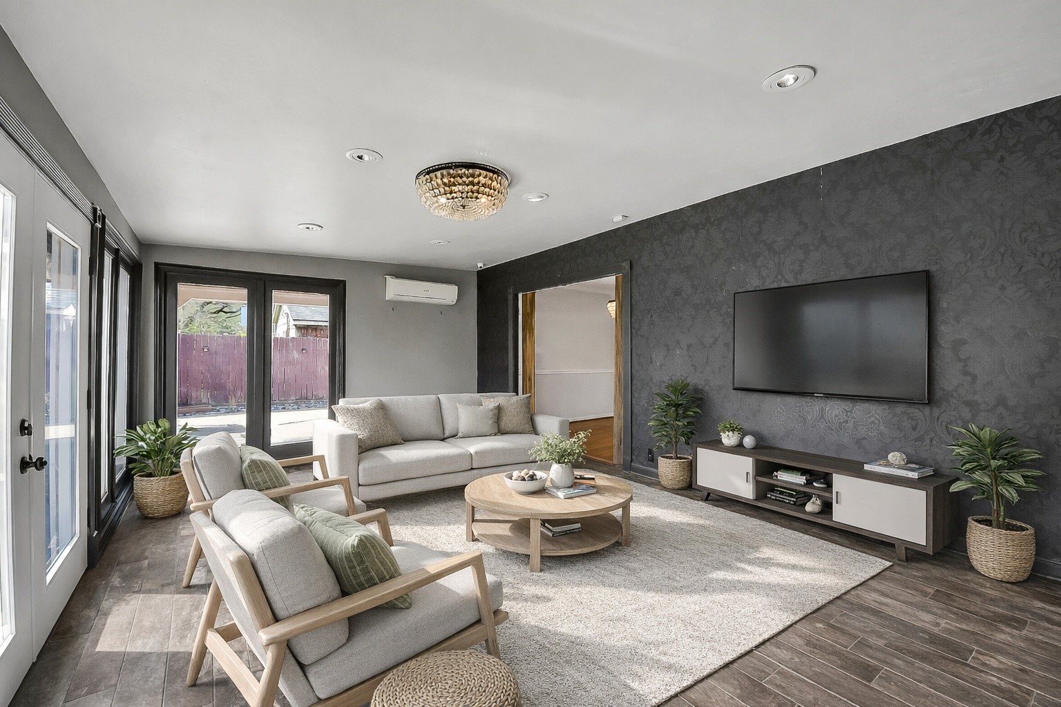 9623 Val Verde Street Houston, TX 77063 - Photo 19 of 26 Light-filled sunroom w/wall of windows, tile flooring & dimmable lighting — virtually staged. Flexible space; could make an ideal playroom, office or additional living space; you name it!