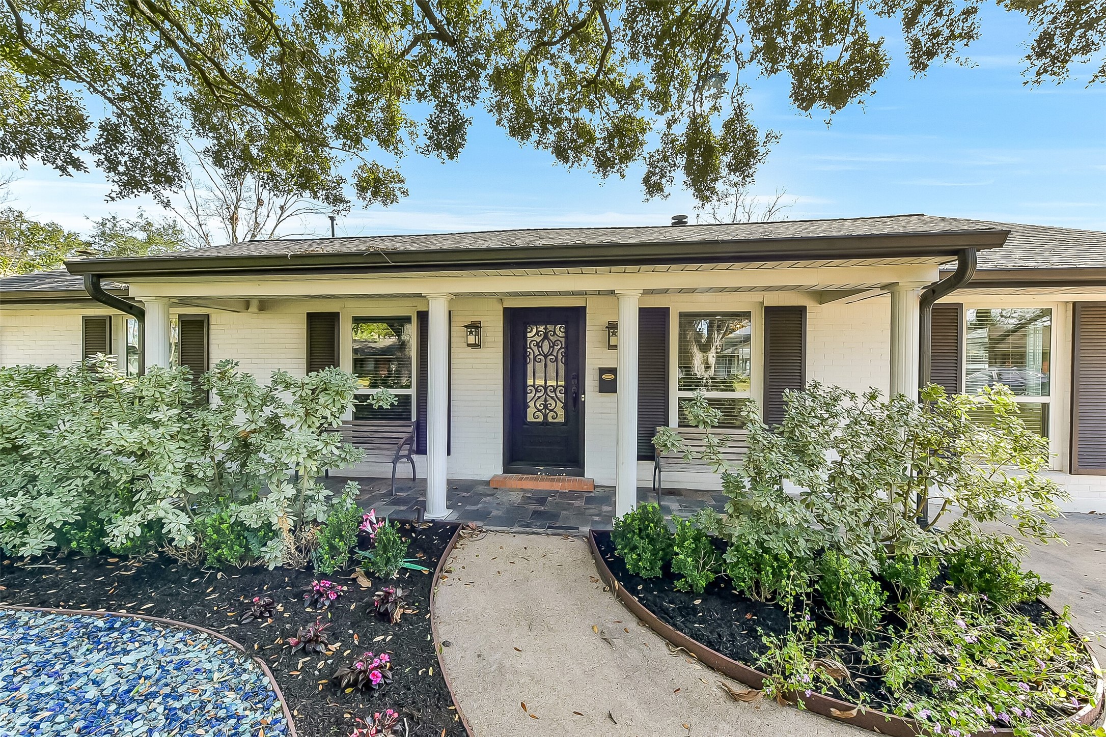 9623 Val Verde Street Houston, TX 77063 - Photo 3 of 26 Wonderful covered front porch. Exterior repainted ('22). Smart Home features include WIFI enabled garage door & sprinkler system..