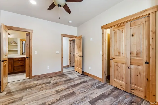 a view of a livingroom with wooden floor