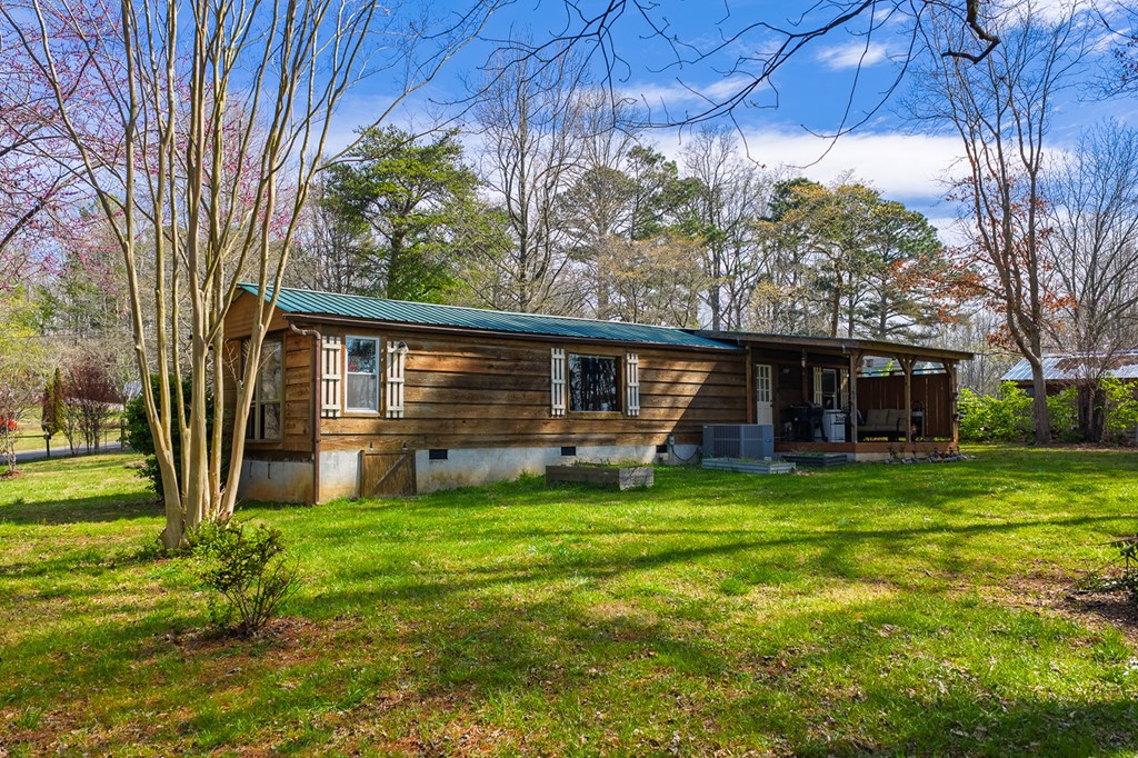 92 Mountain View Drive Jasper, GA 30143 - Photo 2 of 20 a view of a house with a yard