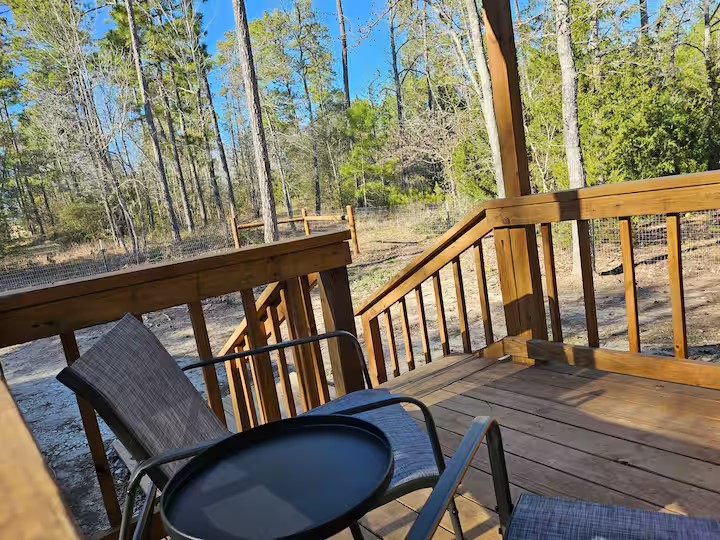 105 Saddle Surrey Road Coldspring, TX 77331 - Photo 4 of 48 a view of a balcony with chairs