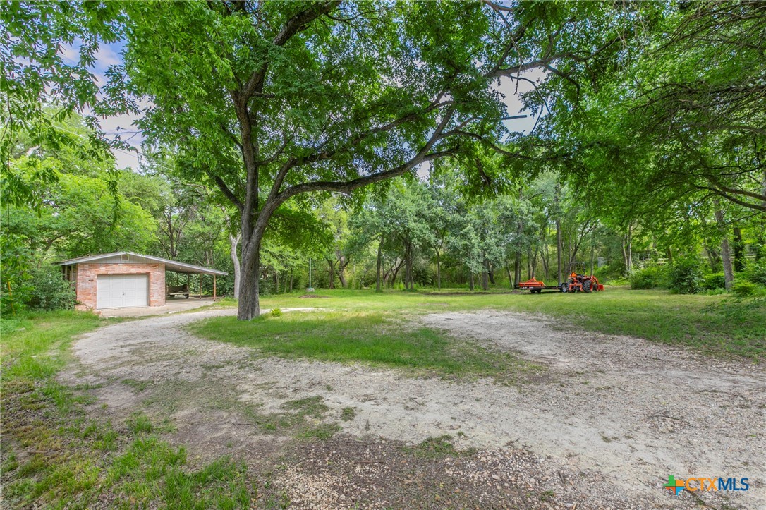 2518 Marlandwood Road Temple, TX 76502 - Photo 45 of 48 a view of a backyard with large trees