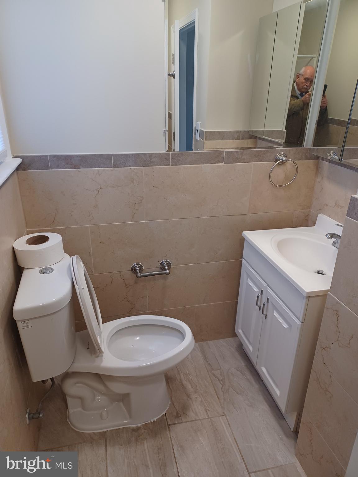 43 Durham Road Penndel, PA 19047 - Photo 4 of 5 a bathroom with a toilet sink and mirror