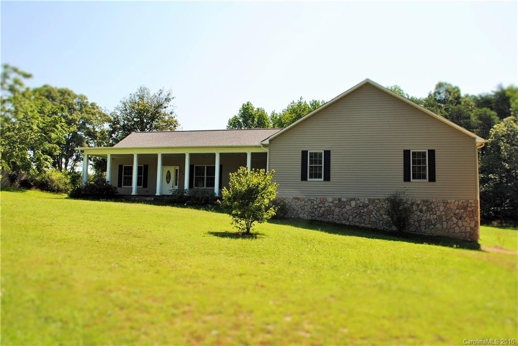 975 Jackson Road Salisbury, NC 28146 - Photo 1 of 24 a view of a house with swimming pool and yard