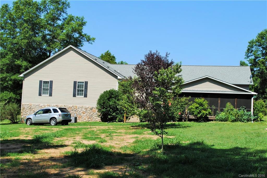 975 Jackson Road Salisbury, NC 28146 - Photo 2 of 24 a front view of a house with a yard