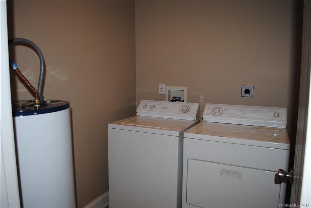 975 Jackson Road Salisbury, NC 28146 - Photo 16 of 24 a utility room with dryer and washer