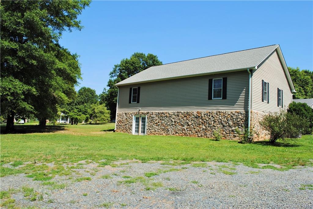 975 Jackson Road Salisbury, NC 28146 - Photo 21 of 24 a front view of house with yard and green space