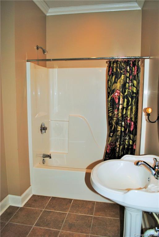 975 Jackson Road Salisbury, NC 28146 - Photo 10 of 24 a bathroom with a bathtub and shower