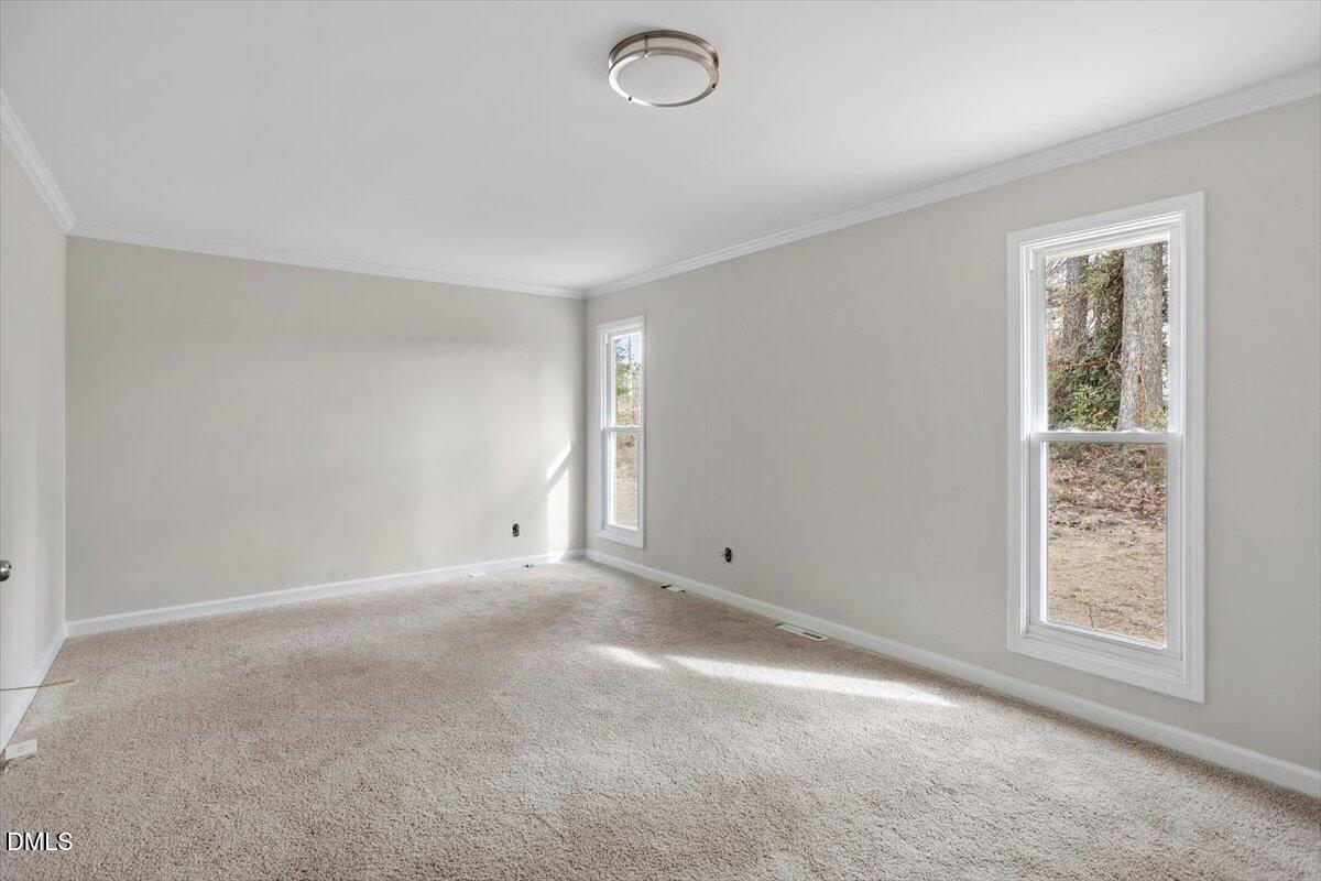 7589 Bray Road Bailey, NC 27807 - Photo 11 of 23 an empty room with windows