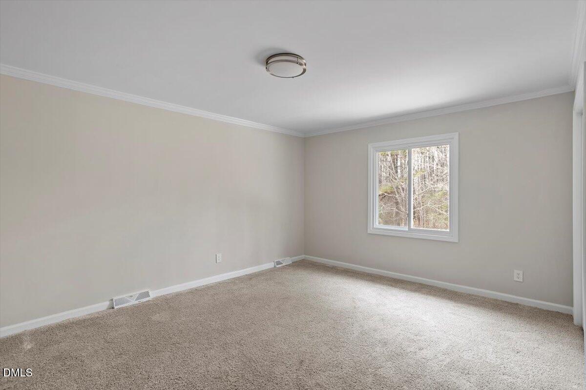 7589 Bray Road Bailey, NC 27807 - Photo 18 of 23 an empty room with windows