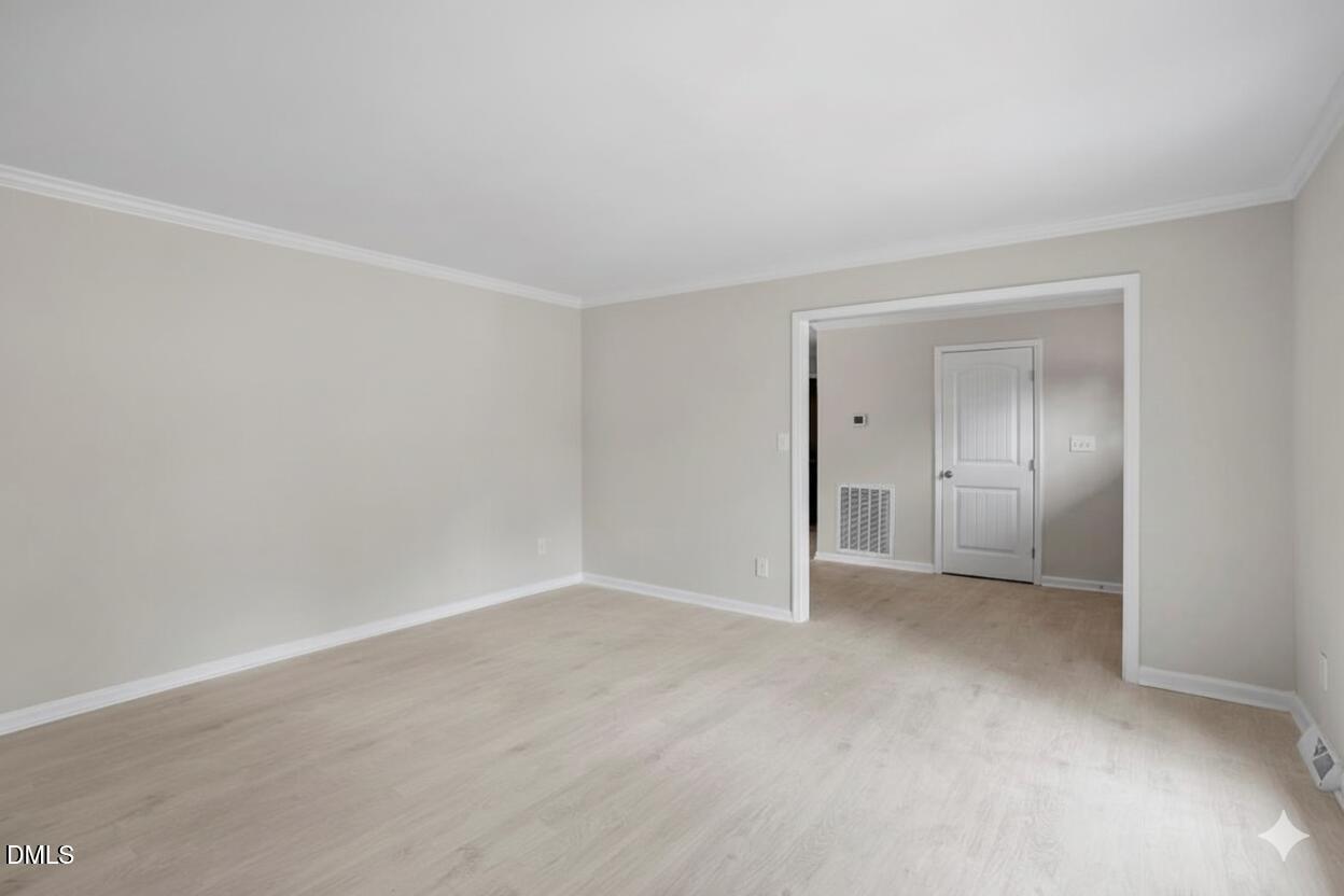 7589 Bray Road Bailey, NC 27807 - Photo 2 of 23 a view of an empty room and a window