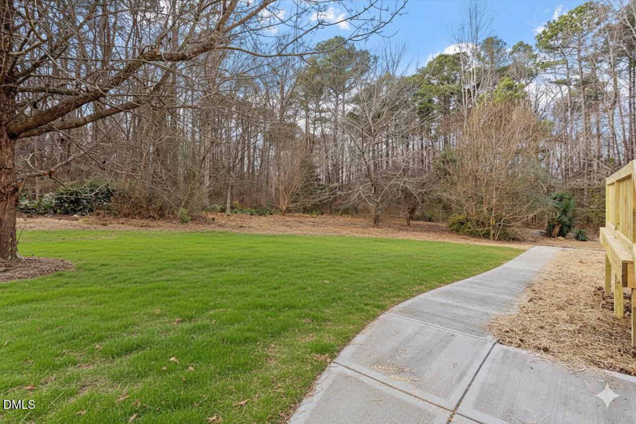 7589 Bray Road Bailey, NC 27807 - Photo 22 of 23 a view of field with tall trees