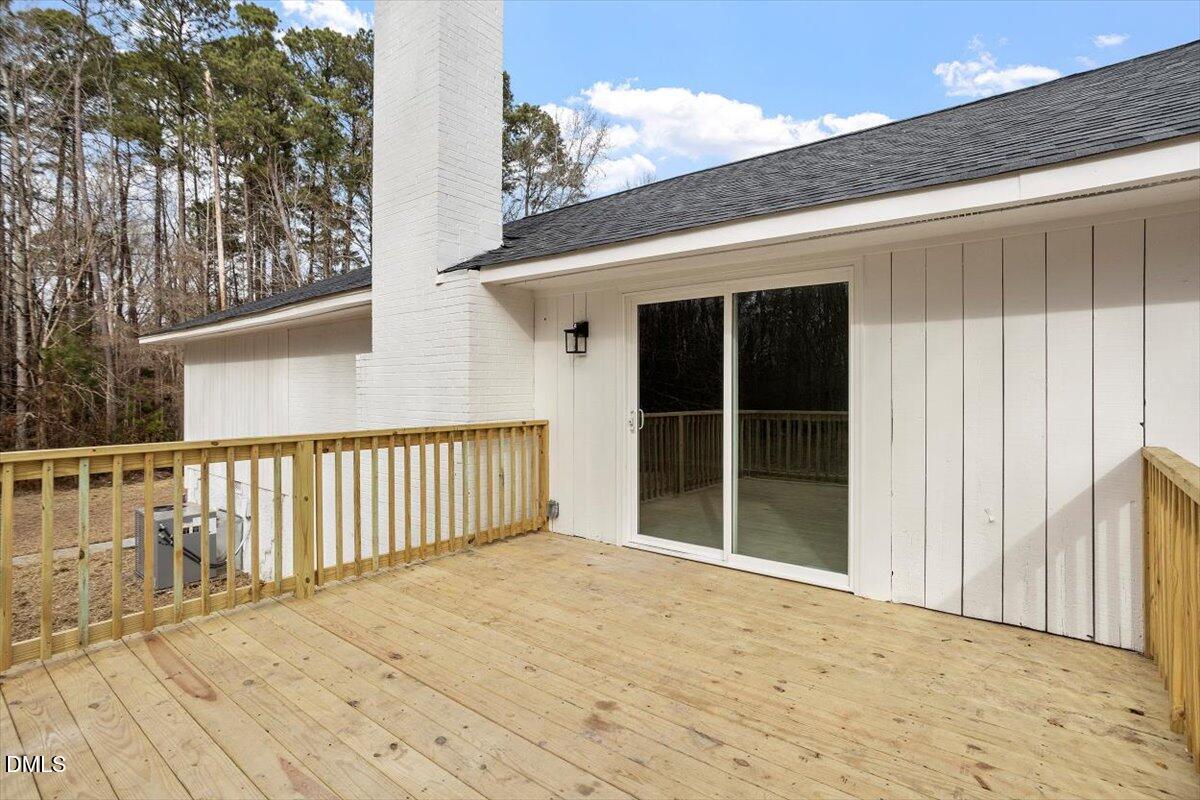 7589 Bray Road Bailey, NC 27807 - Photo 23 of 23 a view of backyard with deck and wooden floor