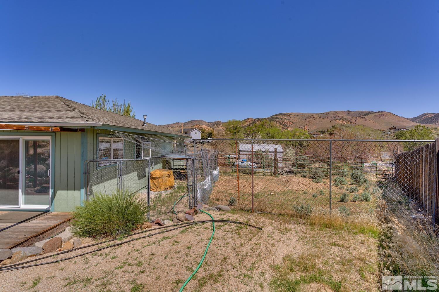 16015 Rocky Vista Road Reno, NV 89521 - Photo 15 of 20 a view of a house with a yard