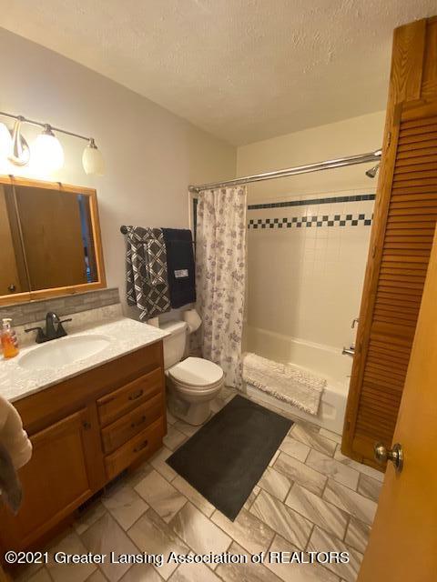 5705 West Columbia Road Mason, MI 48854 - Photo 14 of 53 1st floor bath